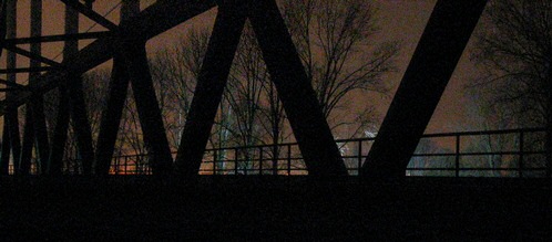 Mysteriously lit trees next to the schalkwijk bridge