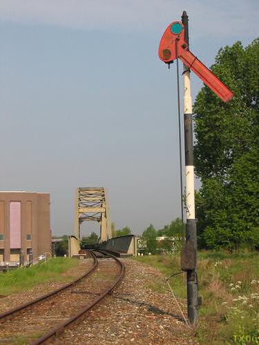 Sign pole and bridge